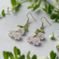 https://www.artistryjewelry.net/products/precious-white-flower-dangle-earrings
