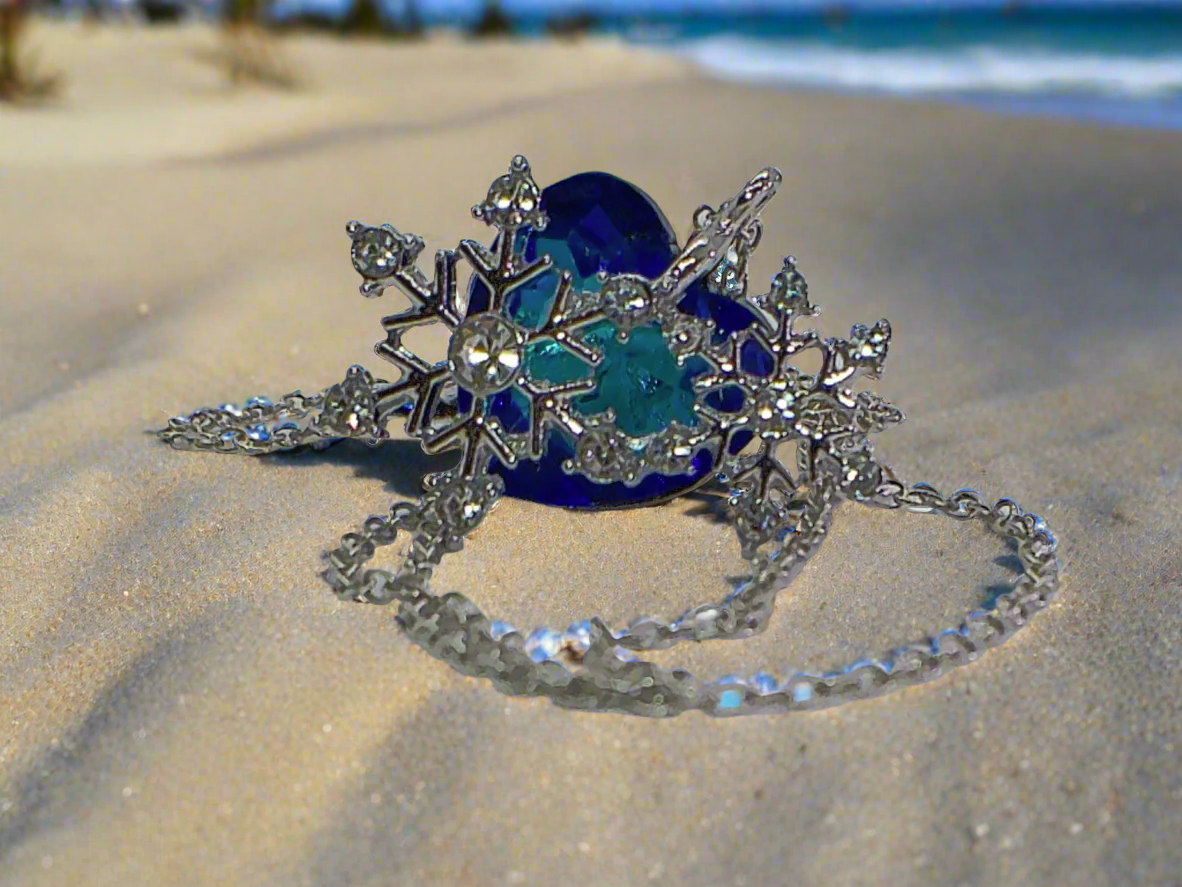 https://www.artistryjewelry.net/products/beautiful-blue-heart-and-snowflake-necklace