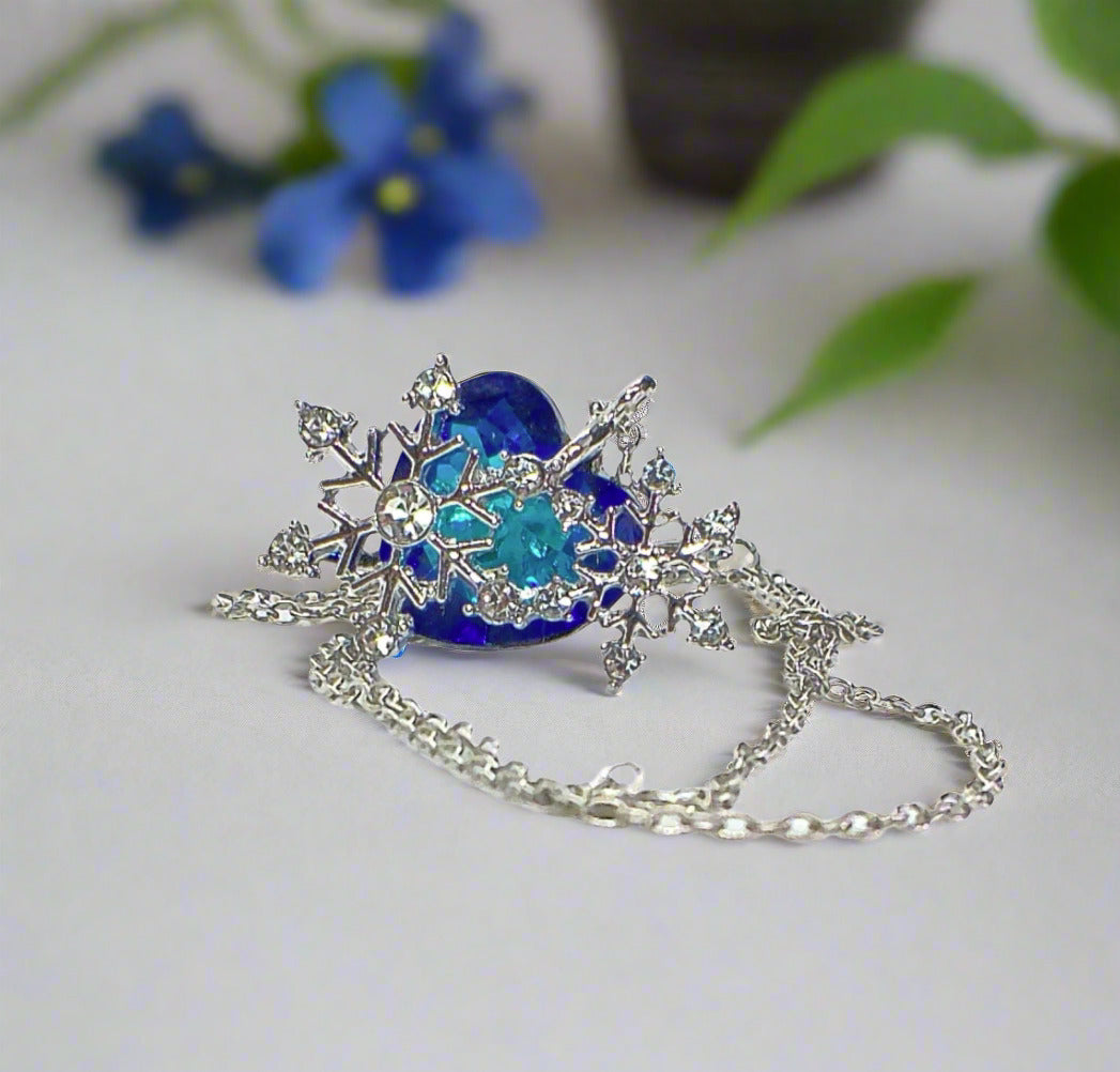 https://www.artistryjewelry.net/products/beautiful-blue-heart-and-snowflake-necklace