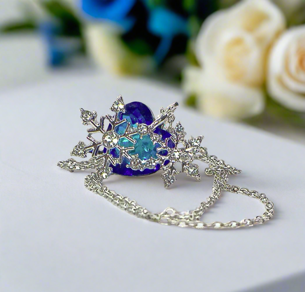 https://www.artistryjewelry.net/products/beautiful-blue-heart-and-snowflake-necklace