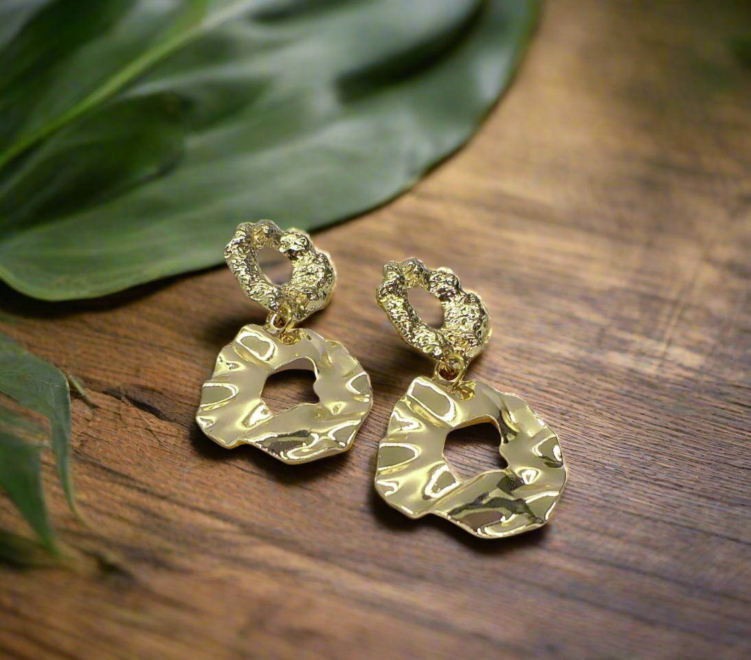 https://www.artistryjewelry.net/products/long-gold-geo-earrings