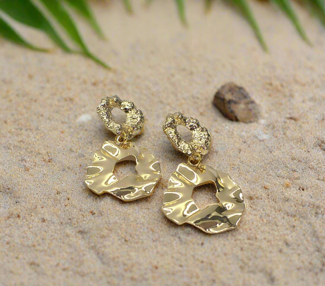 https://www.artistryjewelry.net/products/long-gold-geo-earrings