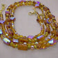 https://www.artistryjewelry.net/products/lovely-sparkles-of-brown-necklace