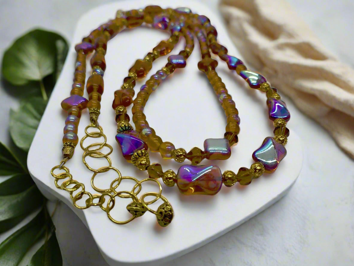 https://www.artistryjewelry.net/products/lovely-sparkles-of-brown-necklace