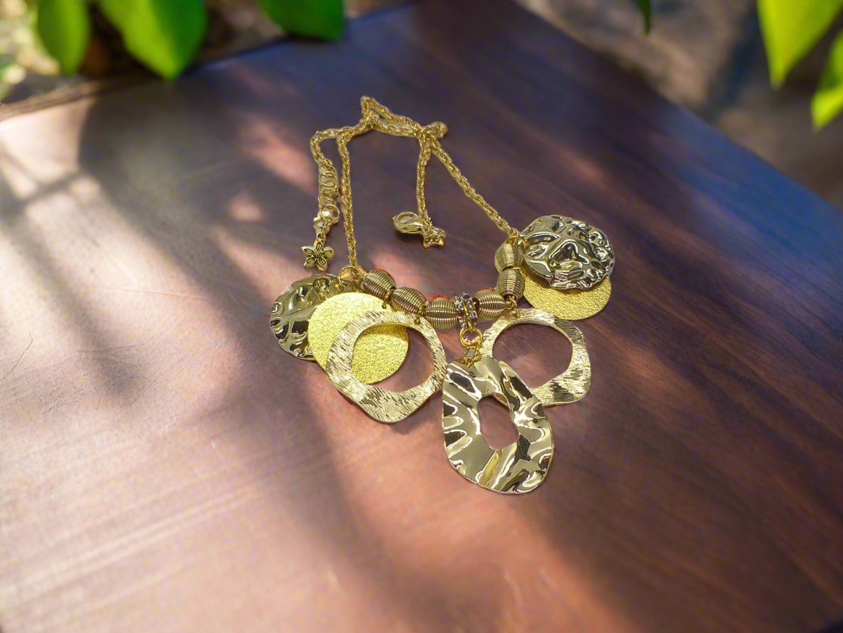 https://www.artistryjewelry.net/products/beautiful-circles-of-gold-necklace
