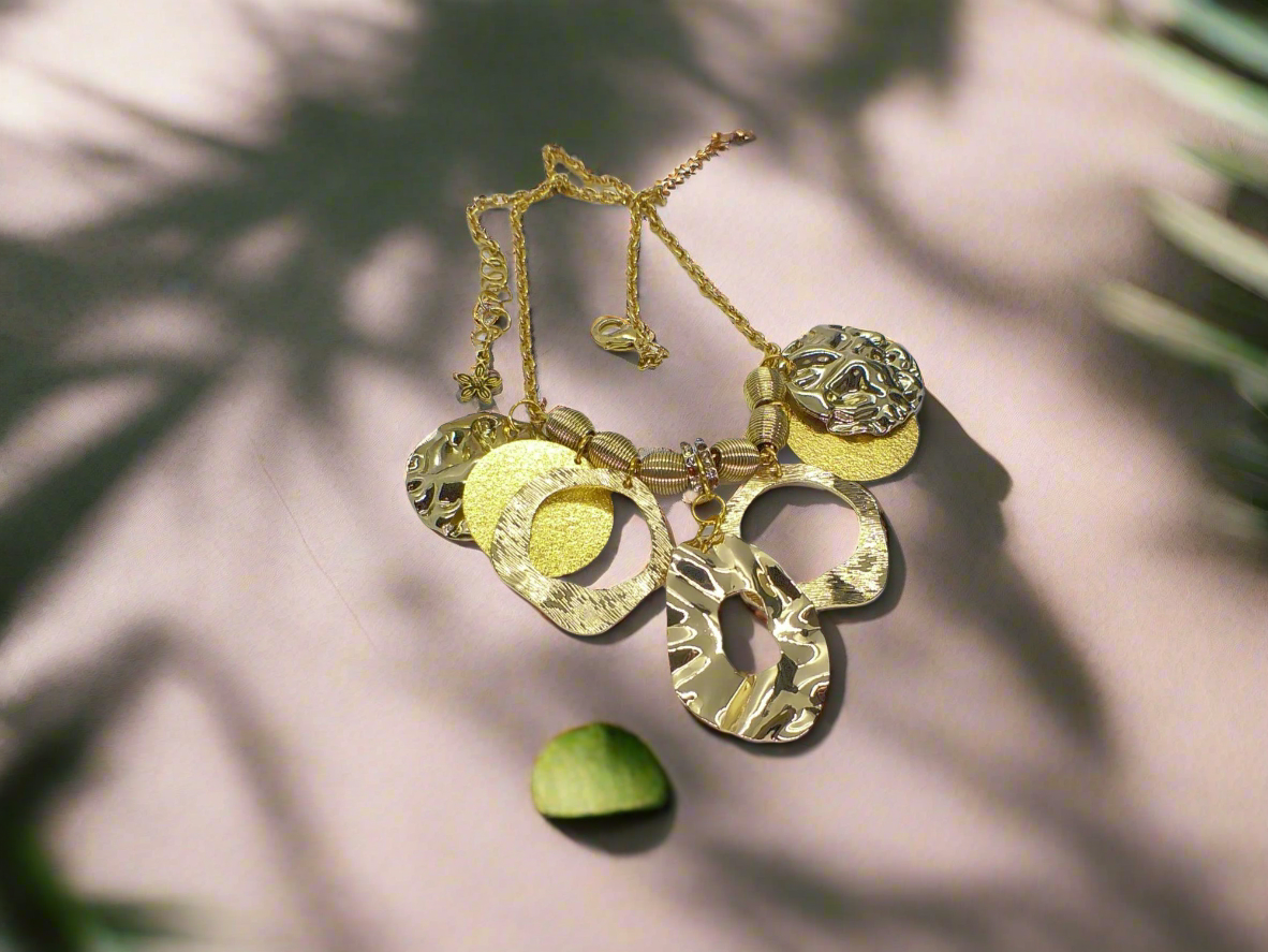 https://www.artistryjewelry.net/products/beautiful-circles-of-gold-necklace
