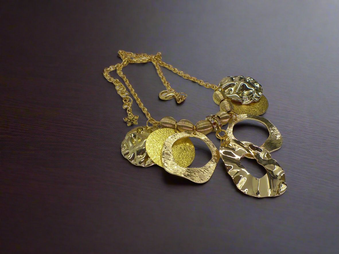 https://www.artistryjewelry.net/products/beautiful-circles-of-gold-necklace