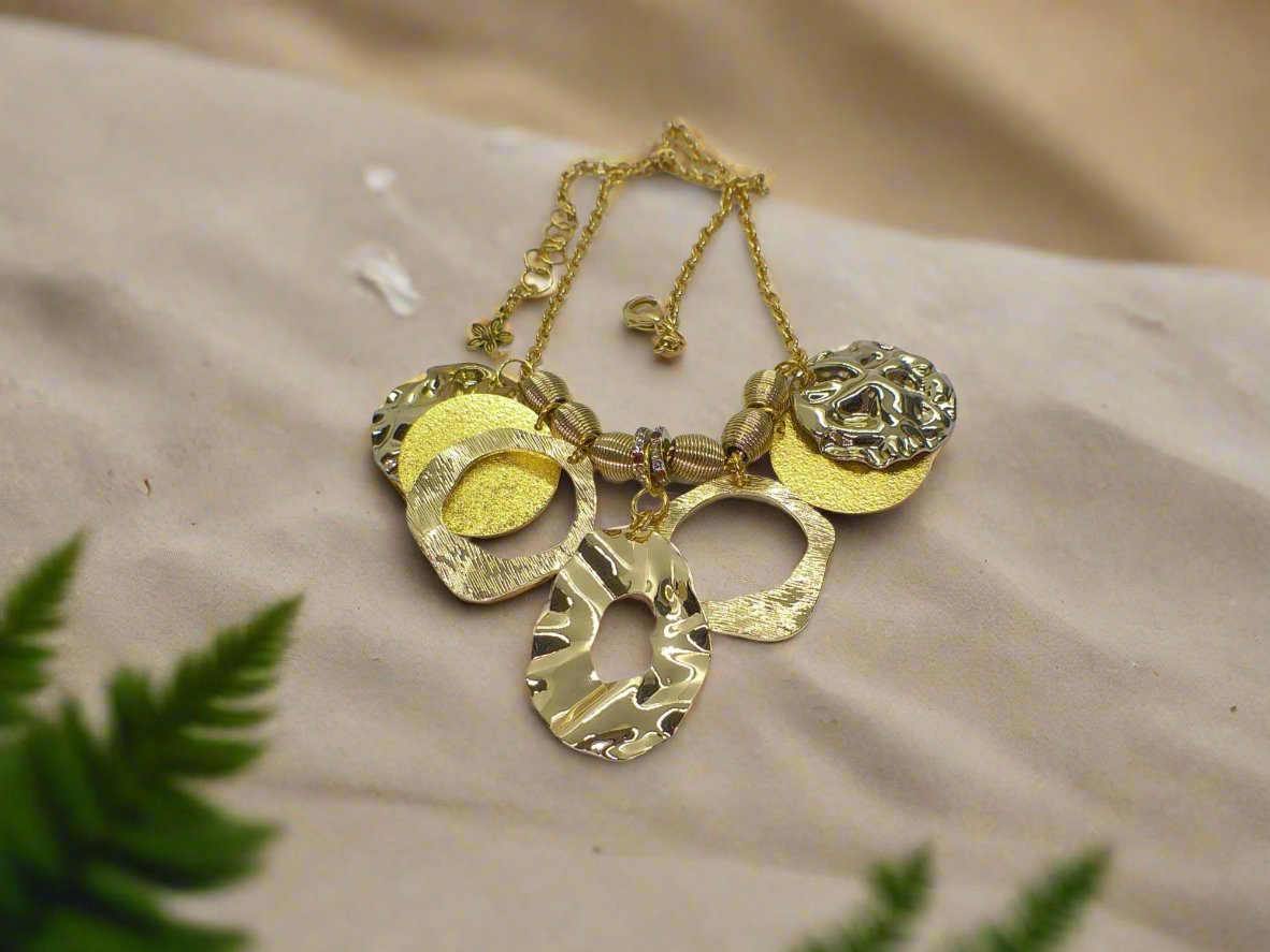 https://www.artistryjewelry.net/products/beautiful-circles-of-gold-necklace