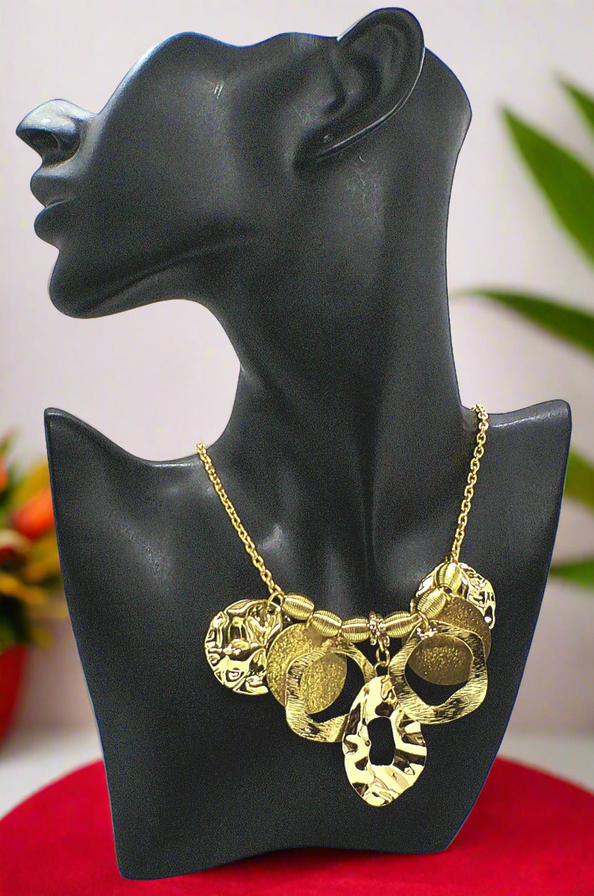 https://www.artistryjewelry.net/products/beautiful-circles-of-gold-necklace