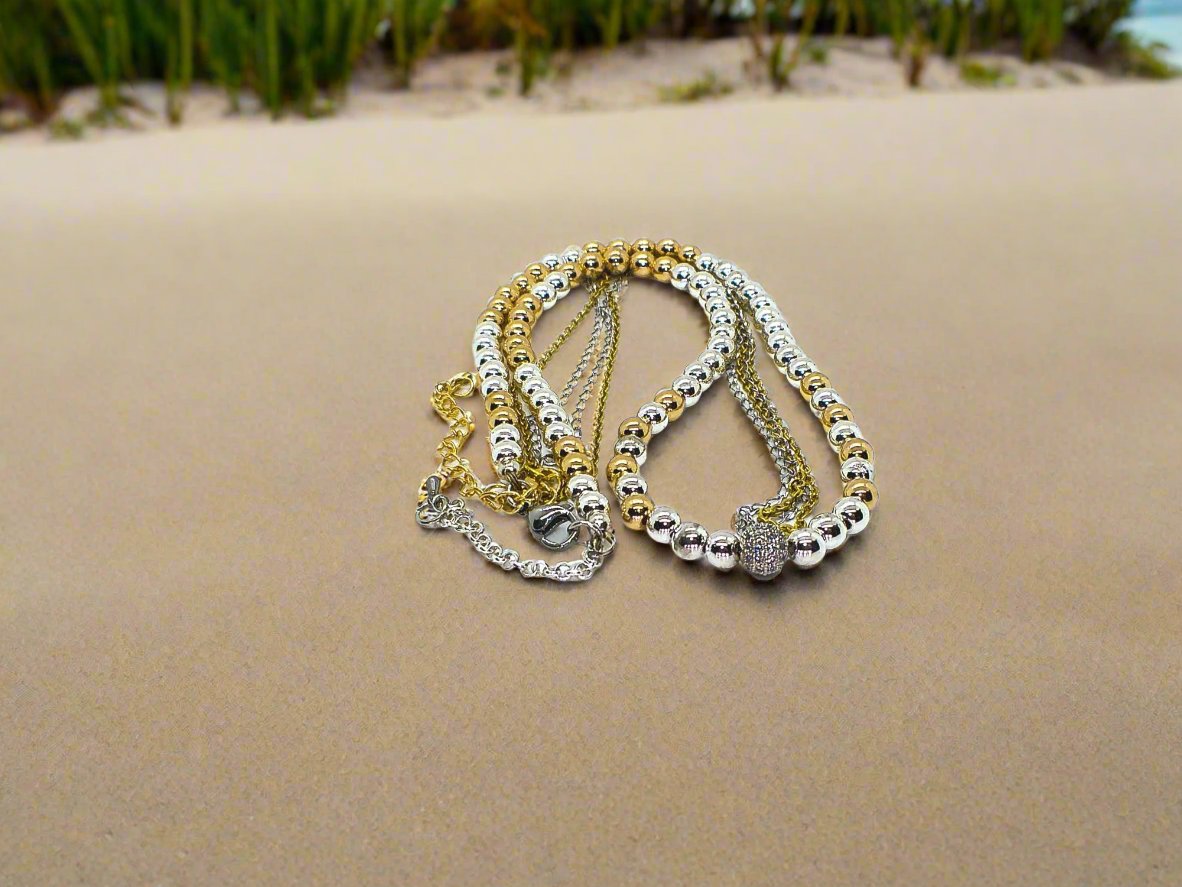 https://www.artistryjewelry.net/products/beautiful-silver-and-gold-hematite-necklace