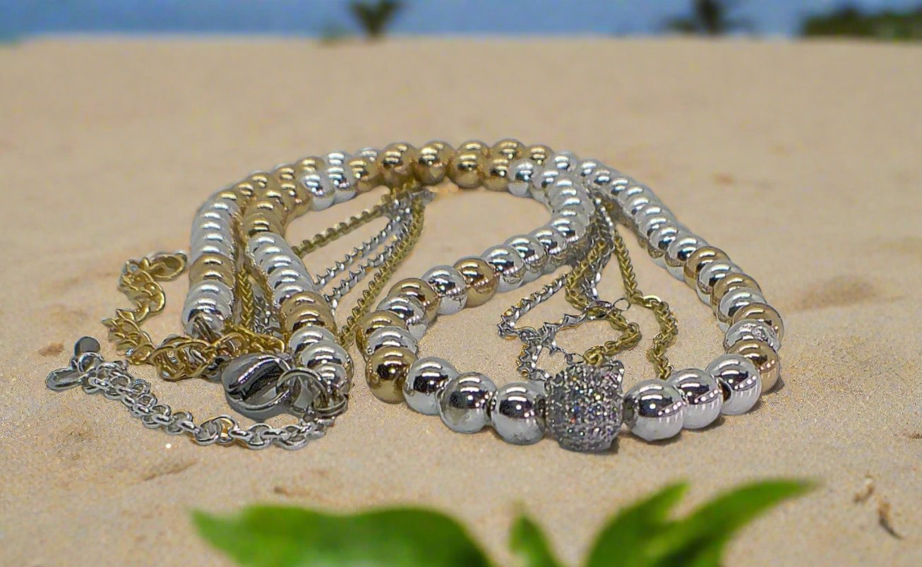 https://www.artistryjewelry.net/products/beautiful-silver-and-gold-hematite-necklace