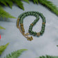 https://www.artistryjewelry.net/products/stunning-olive-green-and-hematite-necklace
