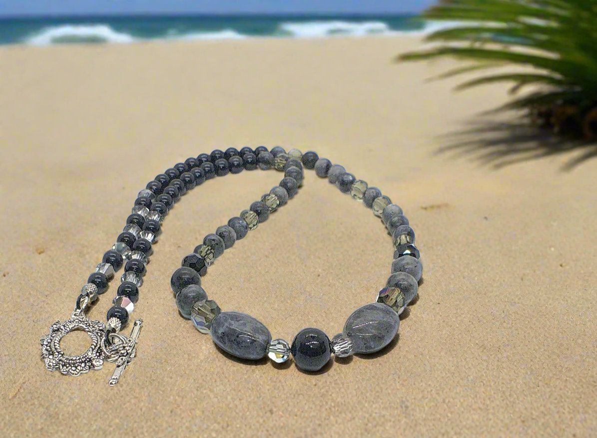 https://www.artistryjewelry.net/products/copy-of-fabulous-black-gray-reflection-a-necklace