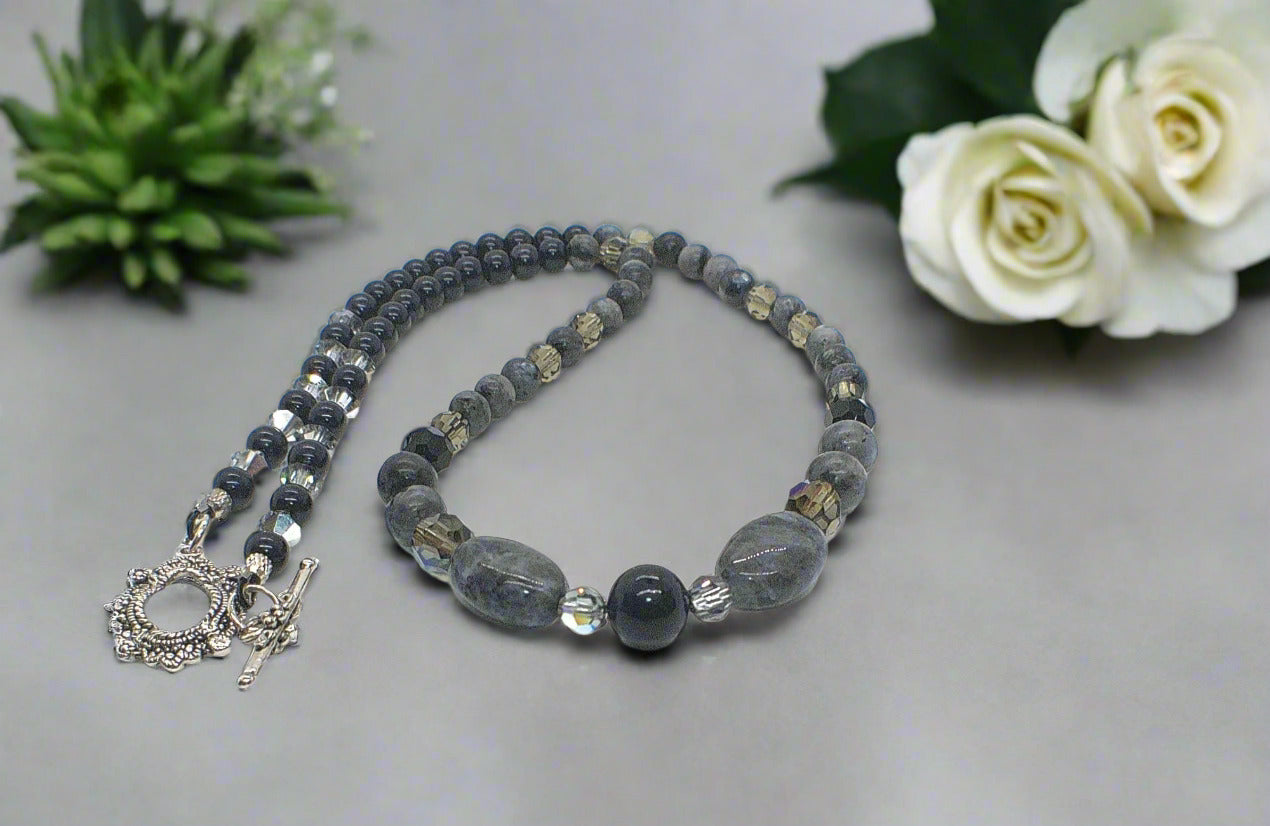 https://www.artistryjewelry.net/products/copy-of-fabulous-black-gray-reflection-a-necklace