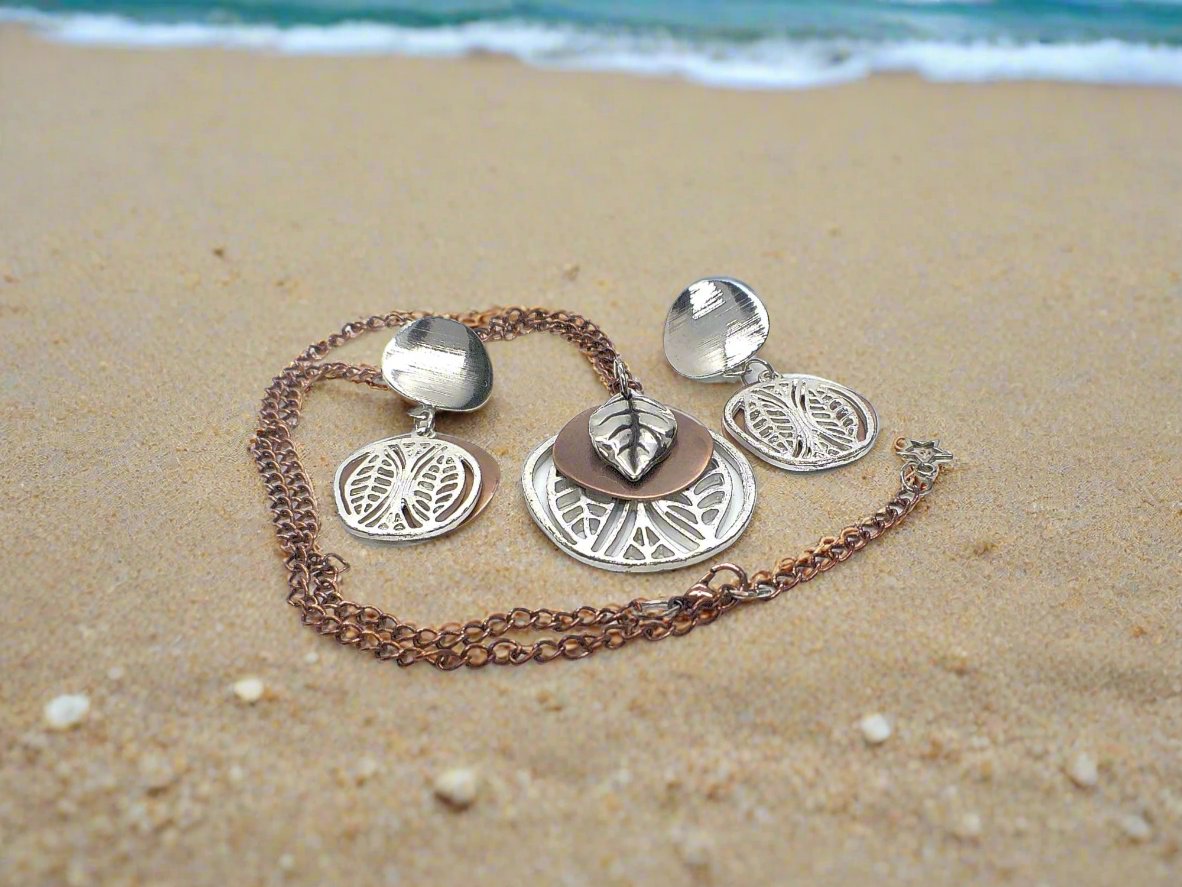 https://www.artistryjewelry.net/products/charming-copper-leaves-necklace-set