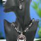 https://www.artistryjewelry.net/products/stunning-silver-and-black-necklace-set