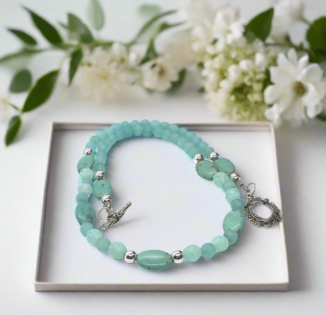 https://www.artistryjewelry.net/products/beautiful-green-goddess-a-matinee-necklace