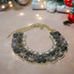 https://www.artistryjewelry.net/products/exquisite-black-diamond-and-gold-necklace