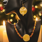 Dazzling Oranges, Tans, and Yellow Mixed Pattered Wood Beads in This Tropical Show Necklace, One-of-a-Kind-handcrafted by Artistry Jewelry