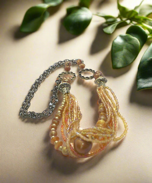 https://www.artistryjewelry.net/products/fancy-seed-beads-forever-necklace