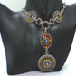 https://www.artistryjewelry.net/products/lovely-chain-and-disc-neckace