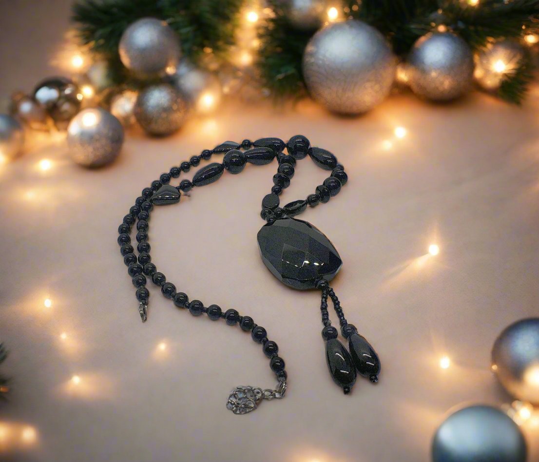 https://www.artistryjewelry.net/products/lovely-black-faceted-necklace