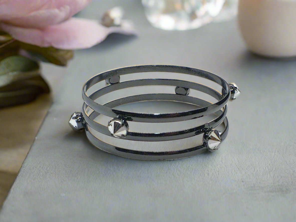 https://www.artistryjewelry.net/products/exciting-triple-bangle-spike-bracelet