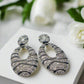 https://www.artistryjewelry.net/products/black-and-silver-stripes
