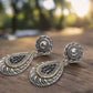https://www.artistryjewelry.net/products/silver-swirl-earrings
