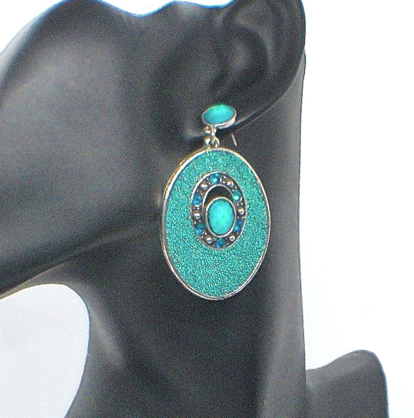 https://www.artistryjewelry.net/products/teal-earrings