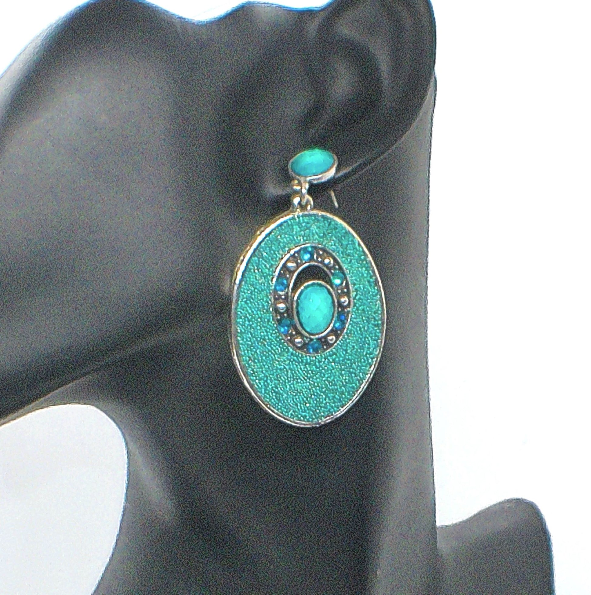 https://www.artistryjewelry.net/products/teal-earrings