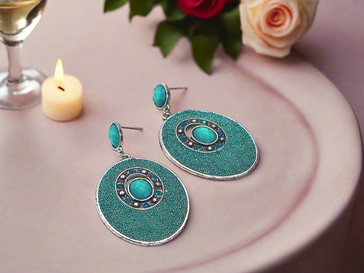 https://www.artistryjewelry.net/products/teal-earrings