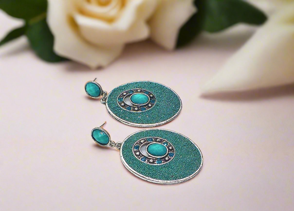 https://www.artistryjewelry.net/products/teal-earrings