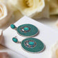 https://www.artistryjewelry.net/products/teal-earrings