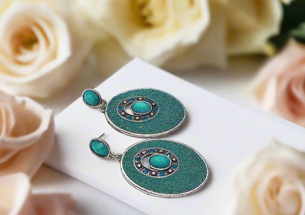 https://www.artistryjewelry.net/products/teal-earrings
