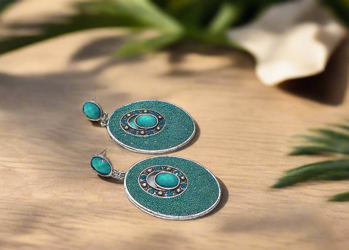 https://www.artistryjewelry.net/products/teal-earrings