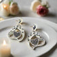 https://www.artistryjewelry.net/products/double-crystal-heart-earrings