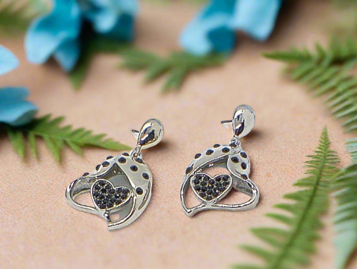 https://www.artistryjewelry.net/products/double-crystal-heart-earrings