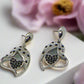 https://www.artistryjewelry.net/products/double-crystal-heart-earrings