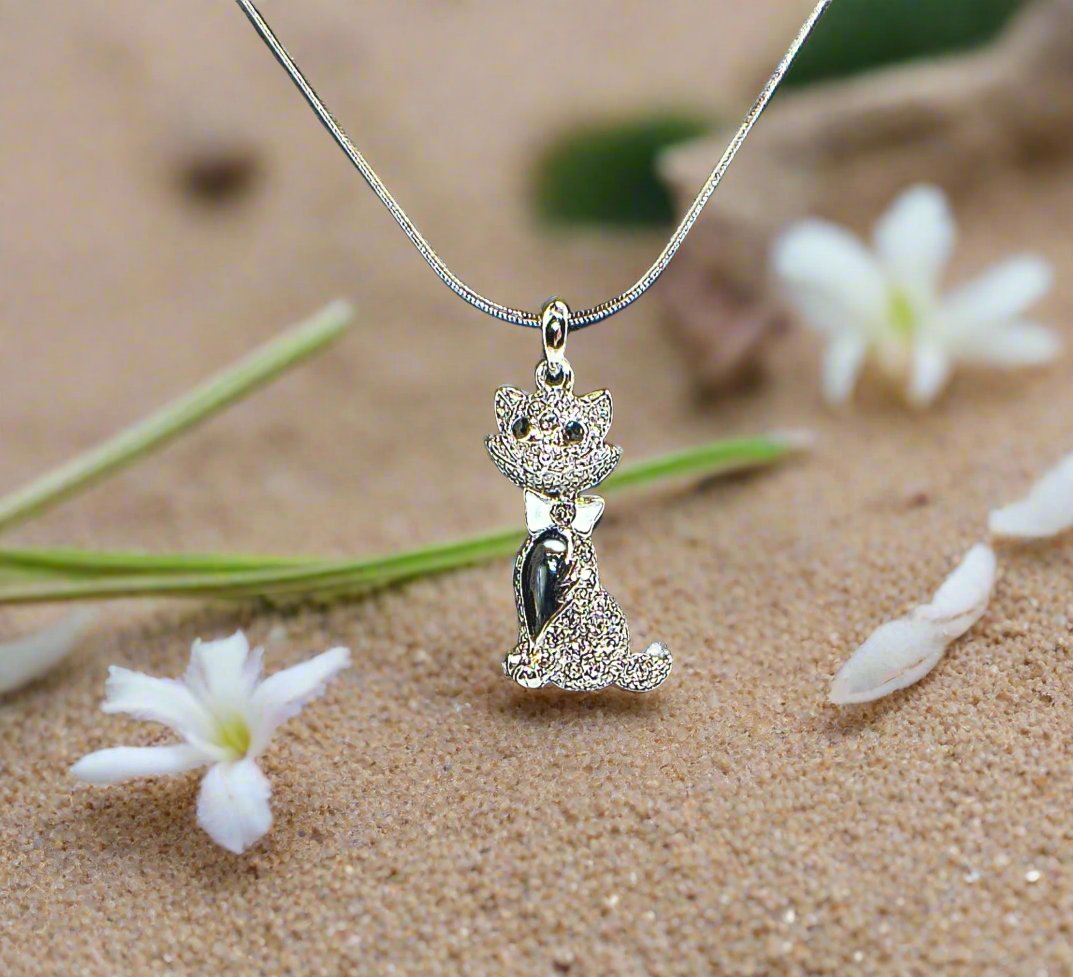 https://www.artistryjewelry.net/products/beautiful-cats-meow-necklace