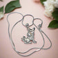 https://www.artistryjewelry.net/products/puppy-love-necklace