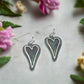 https://www.artistryjewelry.net/products/patina-heart-earrings