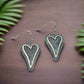 https://www.artistryjewelry.net/products/patina-heart-earrings