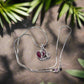 https://www.artistryjewelry.net/products/red-crystal-heart-necklace