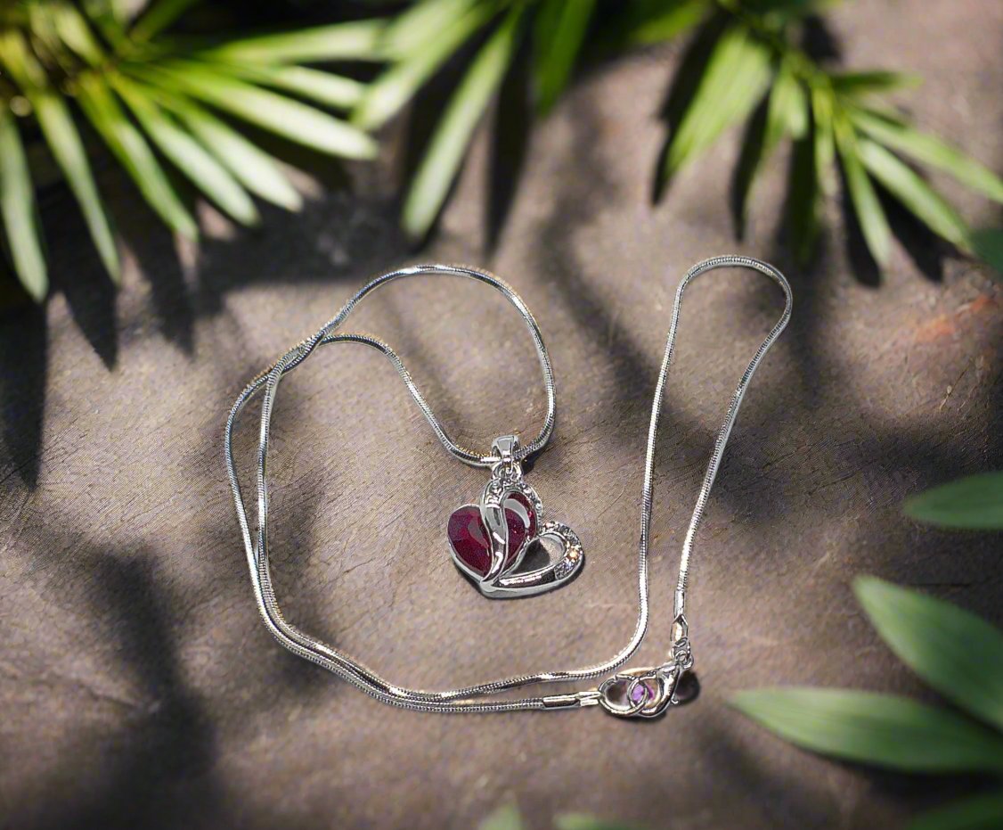 https://www.artistryjewelry.net/products/red-crystal-heart-necklace
