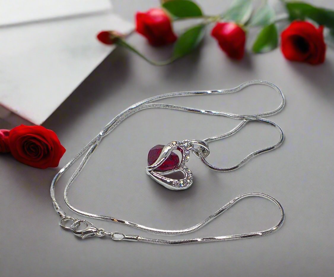 https://www.artistryjewelry.net/products/red-crystal-heart-necklace