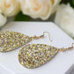 https://www.artistryjewelry.net/products/glittering-teardrop-leather-earrings