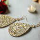 https://www.artistryjewelry.net/products/glittering-teardrop-leather-earrings