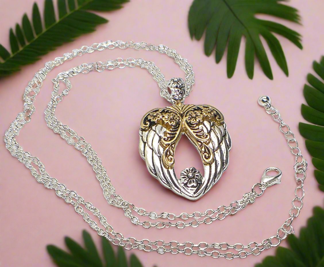 https://www.artistryjewelry.net/products/lovely-religious-inspiration-pendant-necklace