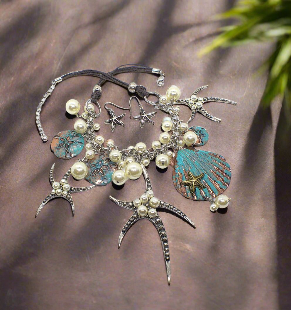 https://www.artistryjewelry.net/products/starfish-and-shell-statement-necklaces-set